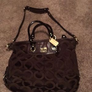 Coach purse. Brown on outside. Turqoise on inside